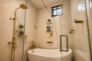 A freestanding bathtub and a shower
