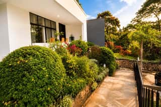 A garden path beside the villa