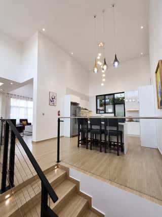 The kitchen and dining space, portrait view